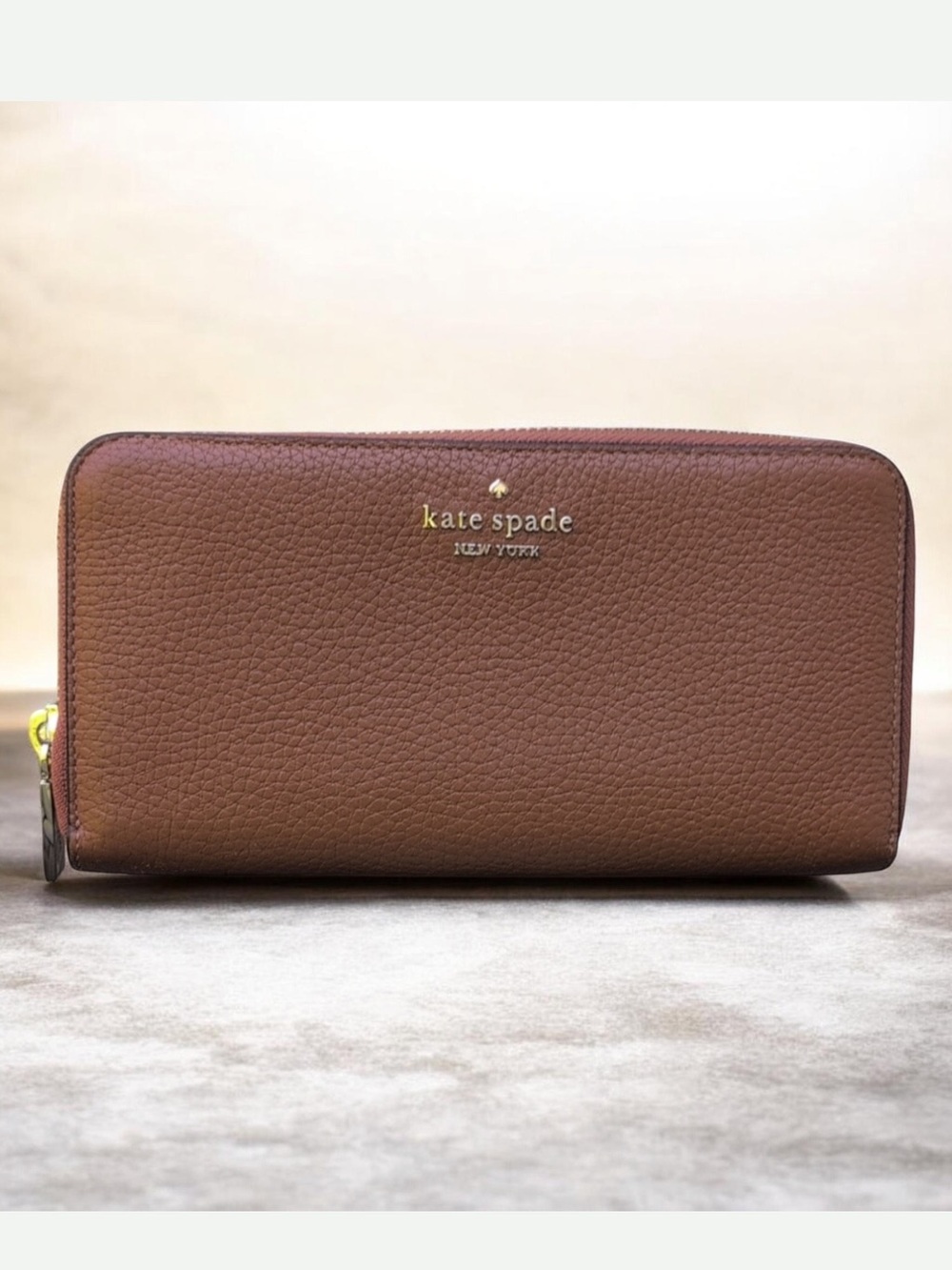 kate spade Brown Pebbled Leather Zip Wallet with Gold Logo